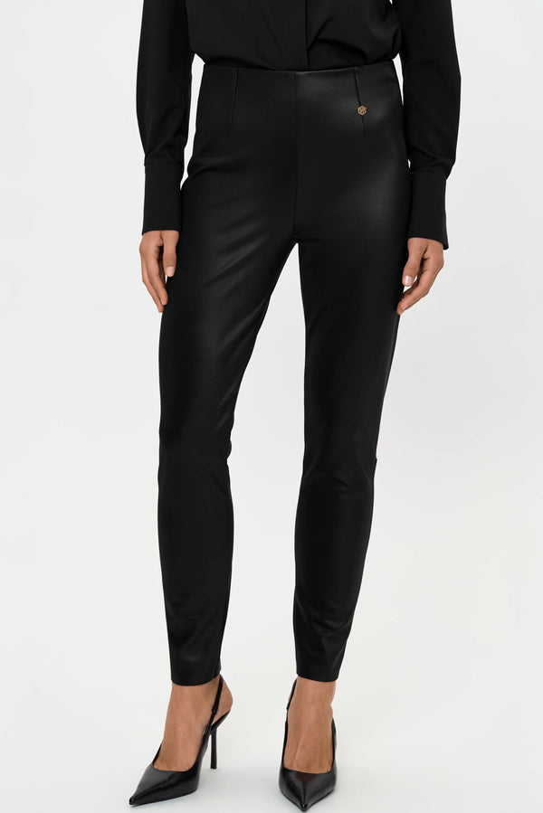 Front close-up of high-waisted shiny black stretch pants with black shirt.